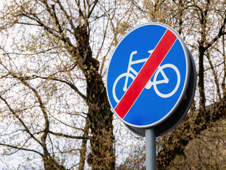 No bikes, bicycles, bikers cyclists allowed blue street sign closeup, nobody, Europe, Poland. Bike laws, regulations, no bike no cycle zone, cycling not allowed simple abstract concept, no peopleの写真素材