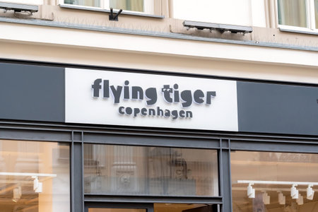 Flying Tiger Copenhagen brand store building front signage logo, sign up close, detail, shop name...