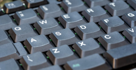 Simple generic older type old retro laptop computer keyboard with thick tall keys object detail...