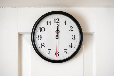 Full clock face showing minutes past noon just past 12 AM or twelve PM time concept, front view,...