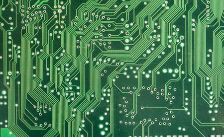 Green printed circuit board closeup with lots of electronic pathways, abstract tech simple background texture, computing, electronics PCB design hardware electronic engineering backdrop concept, frontの写真素材