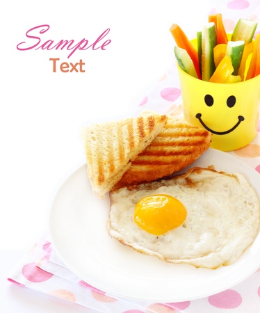 breakfast including egg, toast, vegetablesの写真素材