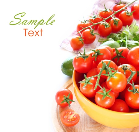 Tomatoes and cucumber isolated on white background の写真素材