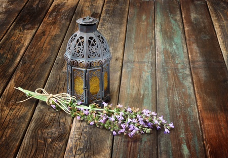 fresh rosemary and sage on wooden tableの写真素材