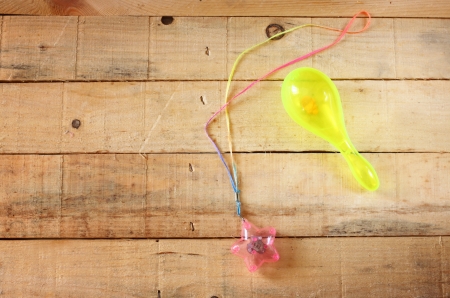 maracas toy on wooden table  party background の写真素材