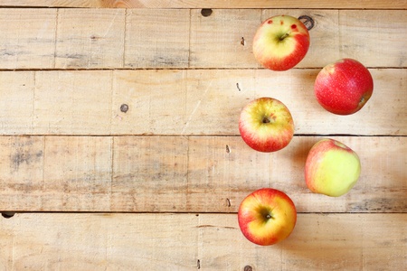 apples on wooden tableの写真素材