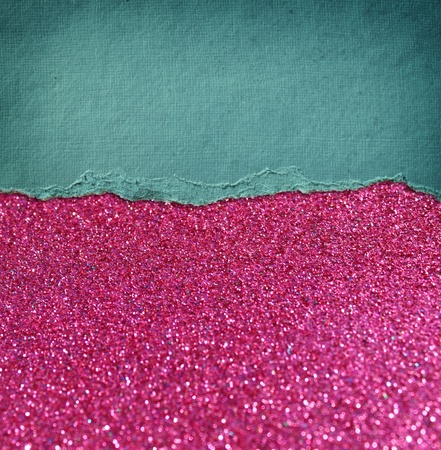 pink glitter background and blue vintage torn paper   room for copy space の写真素材