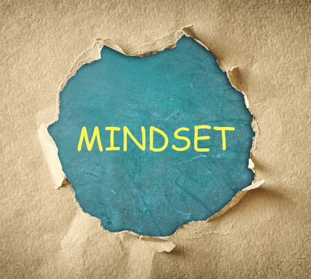 MINDSET Breakthrough paper hole made from textured paperの写真素材