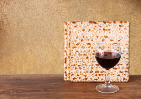 passover background  wine and matzoh  jewish passover bread   over wooden background  の写真素材