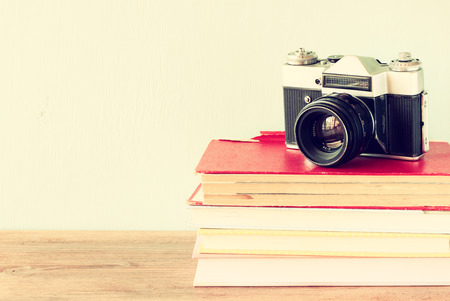vintage camera on old books  vintage effect