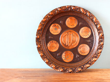 passover background  plate  jewish passover bread  over wooden background  の写真素材