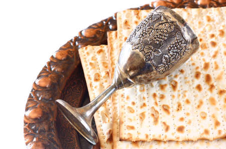 Passover background  wine and matzoh  jewish passover bread   isolated