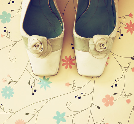 top view of vintage fashion shoes  image is retro filtered の写真素材