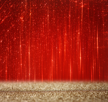 red and gold abstract bokeh lights  defocused backgroundの写真素材