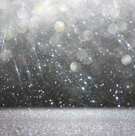 glitter vintage lights background  abstract white and black background  defocusedの写真素材
