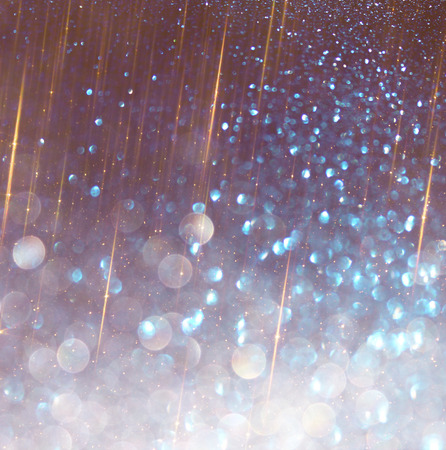 glitter vintage lights background  white and purple  defocusedの写真素材