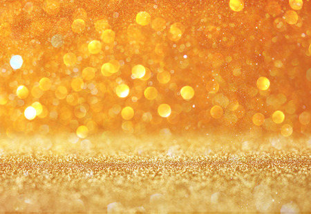 Abstract gold background with copy space . gliiter bokeh lightsの写真素材