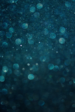 dark blue abstract background. defocused bokeh lightsの写真素材