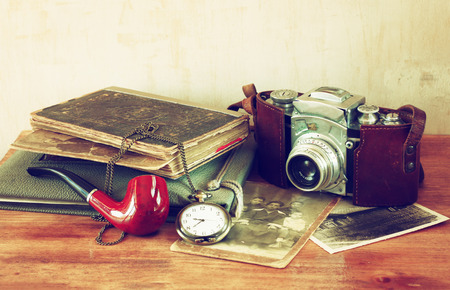 old camera, antique photographs and old pocket clockの写真素材