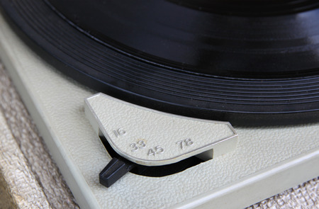 close up image of old record player, image is retro filtered . selective focusの写真素材