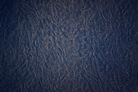 dark blue vintage background with textured surfaceの写真素材