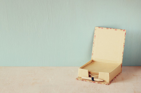 Vintage romantic memo with wooden old pencil. retro filtered imageの写真素材