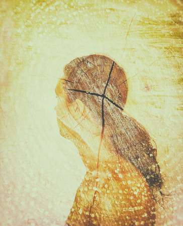 double exposure photo of young woman and tree log texture, retro style image
