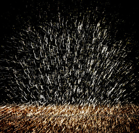 abstract bokeh of light burst (light painting)の写真素材