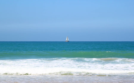background of blurred beach and sea wavesの写真素材