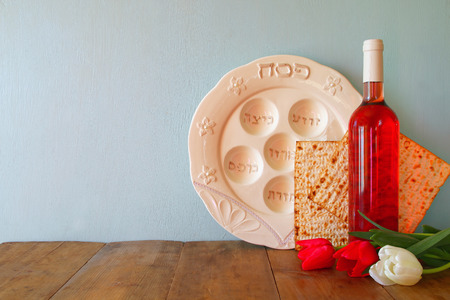 Pesah celebration concept jewish Passover holiday with wine and matzaの写真素材