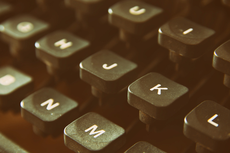 close up image of typewriter keys. vintage filtered. selective focusの写真素材