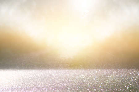 glitter vintage lights background. silver, gold and black. defocused.の写真素材