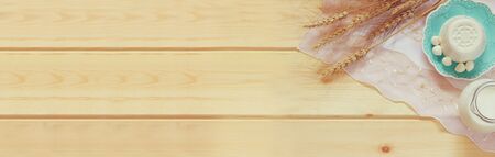 website banner of dairy products and fruits on wooden background.の写真素材