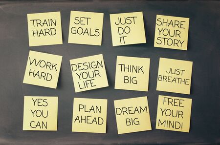 many sticky notes attached to blackboards with handwriting text
