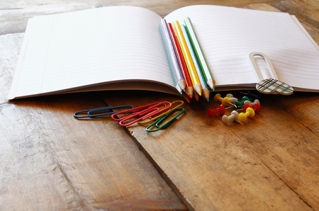 Back to school concept. School supplies on wooden desk. selective focusの写真素材