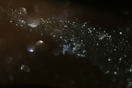 glitter vintage lights background. defocused