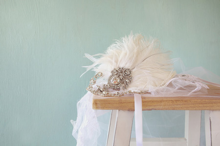 Image of gatsby style diamond head decoration with feathers on toilet tableの写真素材