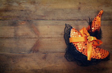 Halloween holiday concept. Witch hat on wooden table.の写真素材