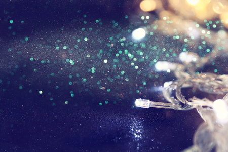 Abstract image of Christmas garland lights on glitter background. Selective focusの写真素材