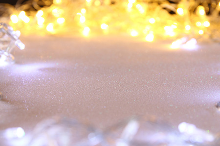 Abstract image of Christmas garland lights on glitter background. Selective focusの写真素材