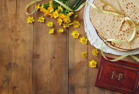 Pesah celebration concept (jewish Passover holiday). Traditional book with text in hebrew: Passover Haggadah (Passover Tale)の写真素材