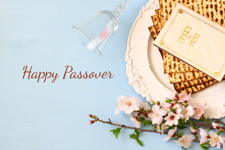 Pesah celebration concept (jewish Passover holiday). Traditional book with text in hebrew: Passover Haggadah (Passover Tale)の写真素材