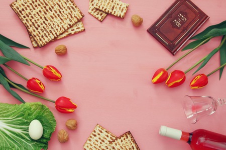 Pesah celebration concept (jewish Passover holiday). Traditional book with text in hebrew: Passover Haggadah (Passover Tale)の写真素材