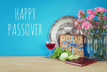 Pesah celebration concept (jewish Passover holiday). Traditional book with text in hebrew: Passover Haggadah (Passover Tale)の写真素材