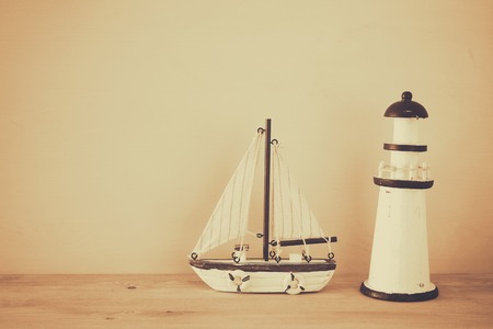Nautical concept with sea life style objects on wooden table. Sepia style filtered imageの写真素材