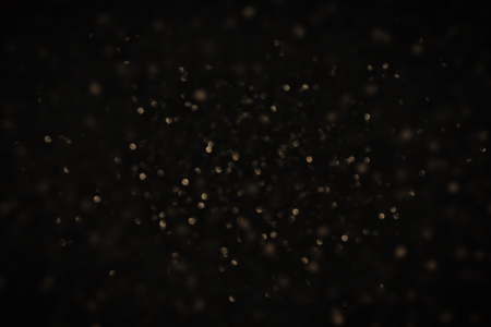 glitter vintage lights background. gold and black. de-focused.の写真素材