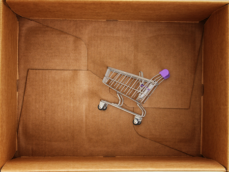 Shopping cart inside of the package box.の写真素材