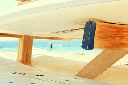 Closeup of surfboards are stored on the tropical beach. Summer travel, recreation and vacation conceptの写真素材