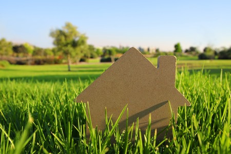 Image of vintage house in the grass, garden or park at sunset lightの写真素材