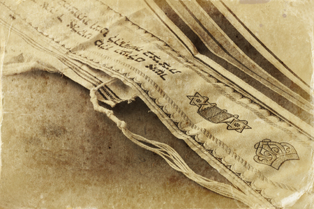 White Prayer Shawl - Tallit, jewish religious symbol. Vintage stile filtered imageの写真素材